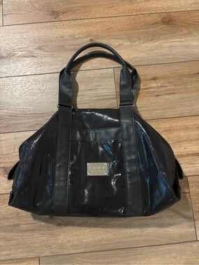 Lollipops Black Snake Embossed Handbag With Cheetah Print Lining